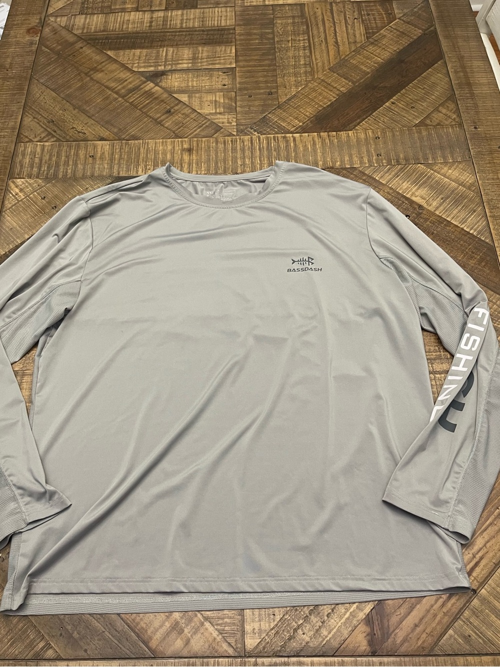 Bassdash long-sleeve performance shirt features "FISHING" text